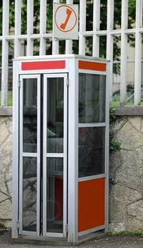 Old italian phone booth called CABINA TELEFONICA Stock Photos
