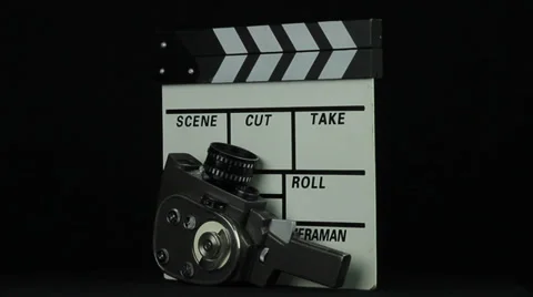 Old items for filming rotate on a black background Stock Footage 34660797