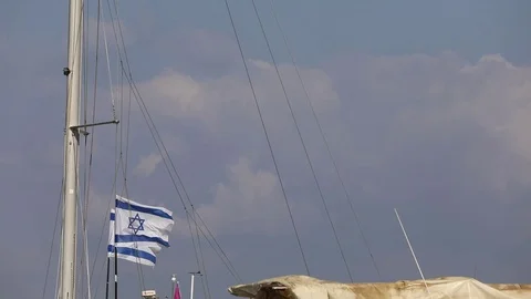 Old Jaffa Harbor. Flags of Israel fluttering in the wind. Stock Footage 80975483
