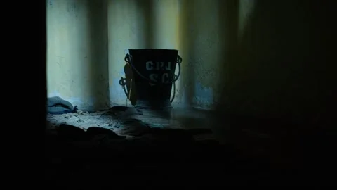 An old jail cell door closing and opening. 4K Stock Footage 323821433