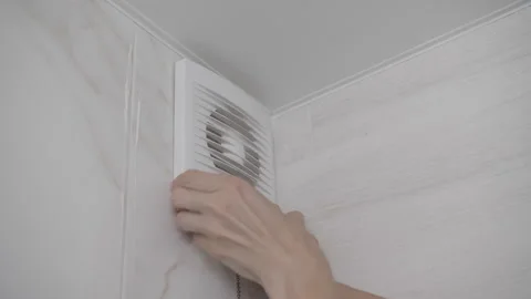 Old Jammed Exhaust Fan Panel Difficulty During Home Ventilation Service Stock Footage 341396626