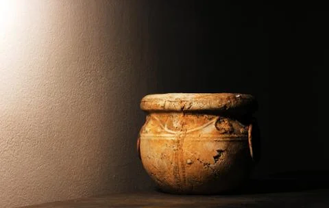Old jar in semi shadow Foto stock
