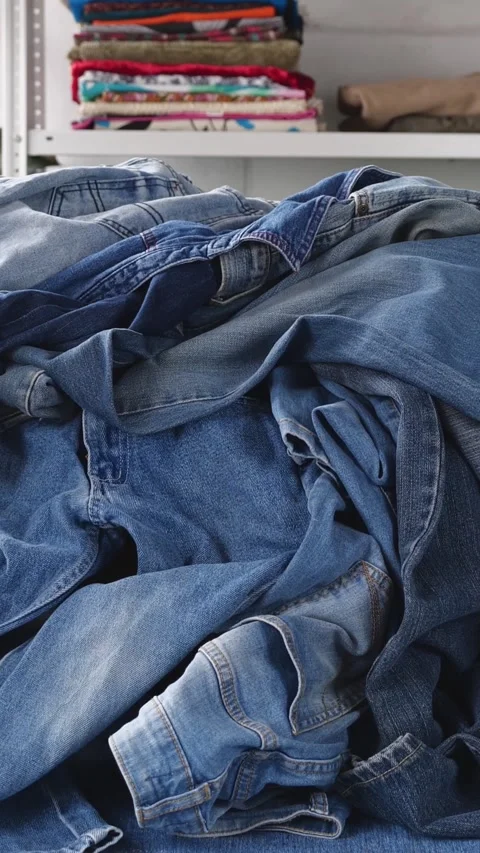 Old jeans that will be used for creating sustainable fashion pieces Video stock 308855035