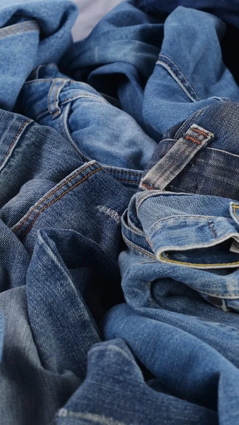 Old jeans that will be used for making eco-friendly accessories and bags Video stock 323318772