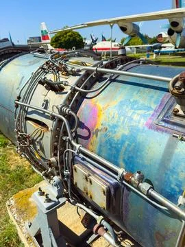 An old jet engine is on display at an outdoor aviation museum during summer.  Foto stock