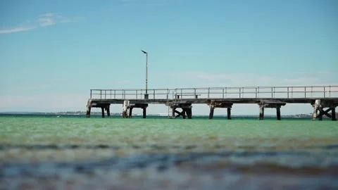 Old jetty on a summers day 4k Stock Footage 324700742