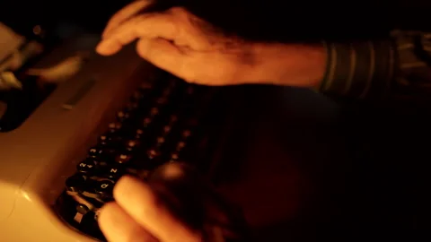 Old journalist using his antique typewriter machine for working with documents Stock Footage 149524048