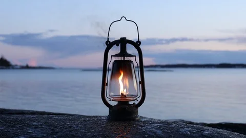 Old kerosene lamp on the rock. Stock Footage 126837697