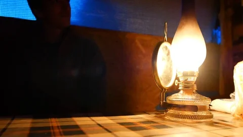 Old kerosene lamp on the table Stock Footage 116249197