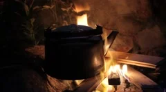 An Old Kettle Over The Camp Fire. The Kettle Boils Water For Tea Stock  Photo, Picture and Royalty Free Image. Image 84570904.