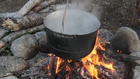 Old kettle on a marching fire Stock Footage 79527228