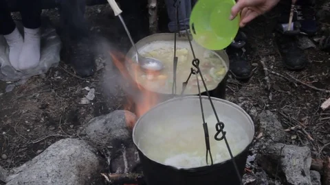 Old kettle on a marching fire Stock Footage 79527837