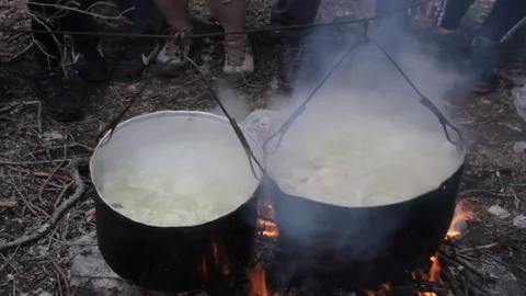 Old kettle on a marching fire Stock Footage 79528471