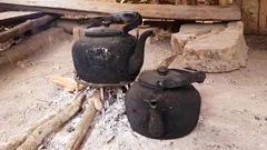 An Old Kettle Over The Camp Fire. The Kettle Boils Water For Tea Stock  Photo, Picture and Royalty Free Image. Image 84570904.