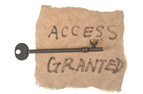 Old key and access granted words Stock Photos
