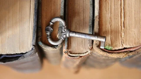 Old key and books Stock Footage 58123768
