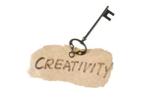 Old key and creativity word Stock Photos