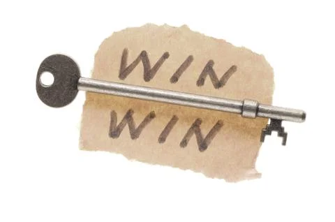 Old key and win-win words Stock Photos