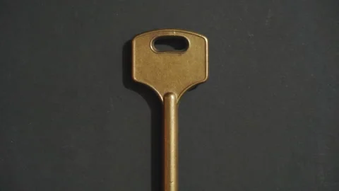 Old key on a black background. Close-up Stock Footage 121341837