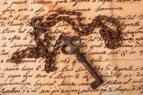 Old key with chain Stock-Fotos