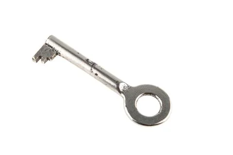 Old key isolated on white background Foto stock