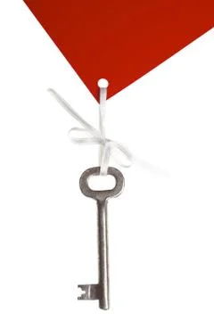 Old key with red label Stock Photos