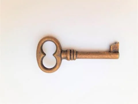 Old key on white background. Stock Photos
