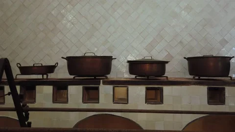 Old kitchen with steel pots Stock Footage 136429097