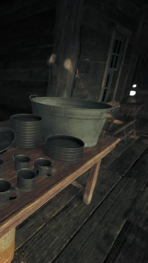 Old kitchen tools and utensils displayed on a wooden table in a rustic setting Stock Footage 341981942