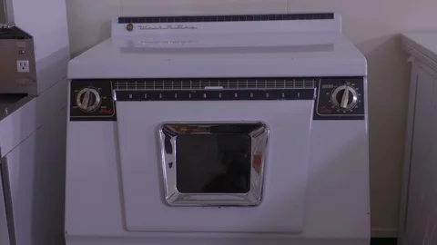 Old kitchen washer to oven 스톡 동영상 106727721