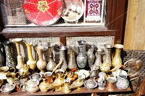 Old kitchenware trays, teapots, coffee turks, samovars, pans, plates, Stock Photos