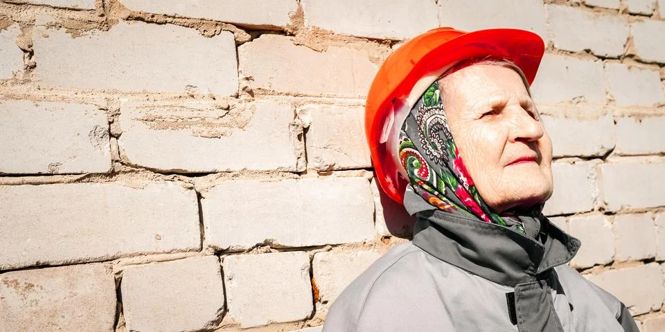 Old lady builder Stock Photos