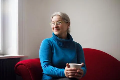 Old lady with a cup of tea Stock Photos