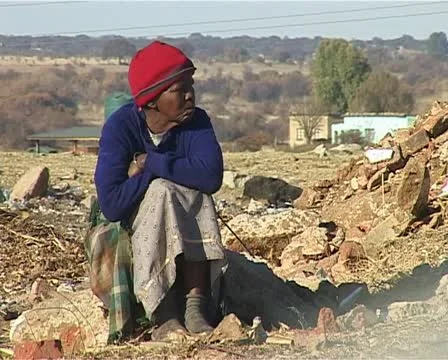 A old lady at the dump site. Stock Footage 11496667