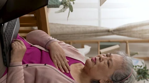Old lady is gesturing hi and touching her chest Stock Footage 231677633