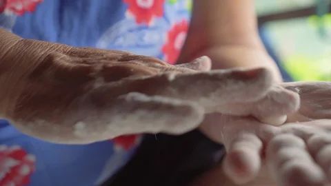 Old lady kneading normal flour to a ball. Prepare for baking. Traditional way. Stock Footage 114314215