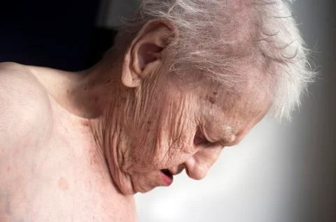 Old lady looking down Stock Photos