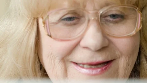 The old lady is reading a message Stock Footage 80455681