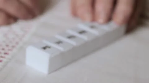 Old lady taking pills Stock Footage 12661385