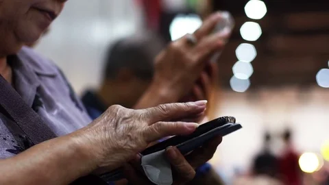 Old Lady Using a Mobile Phone Stock Footage 78021214