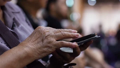 Old Lady Using a Mobile Phone Stock Footage