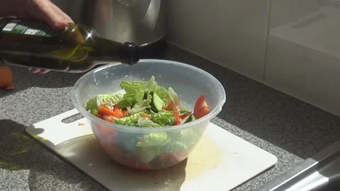 An old ladymaking salad Stock Footage 94924412