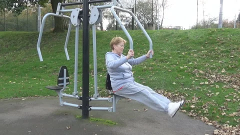 An old ladys workout in park Video stock 86200977