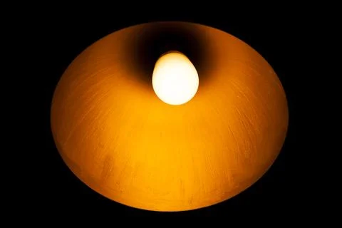 Old lamp on a black background Foto stock