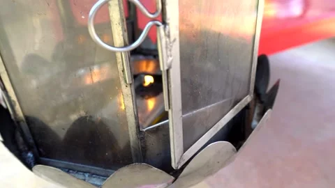 The old lamp glows from the fire. Temple. Video stock 152508458