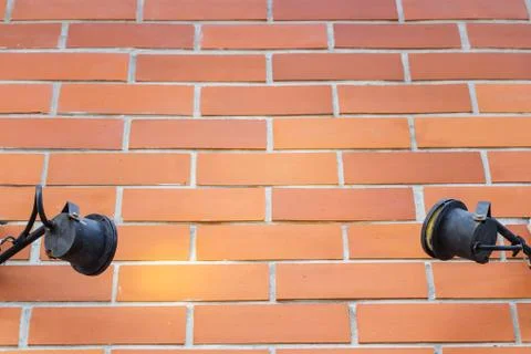 Old lamp lighting wall texture with space for some text Stock Photos