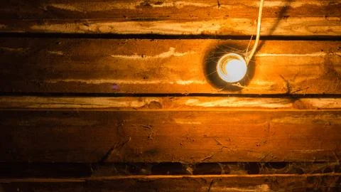 Old lamp on planks Foto stock