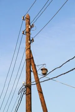Old lamp post on a background of blue sky Stock-Fotos