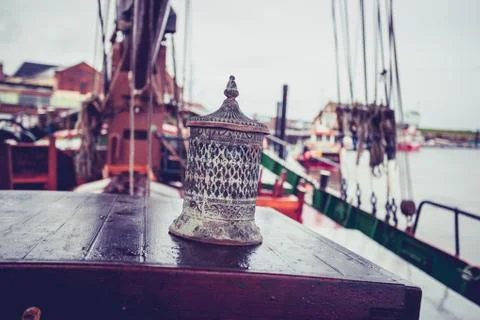 Old lantern on the deck of a ship Stock Photos