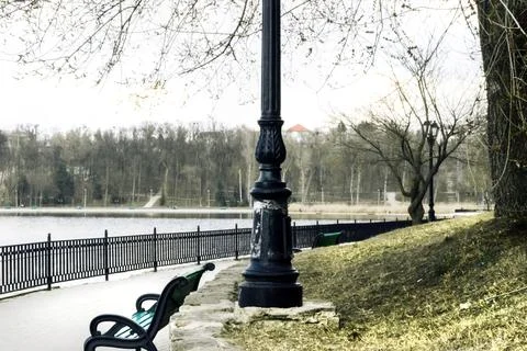 Old lantern by the lake Stock Photos